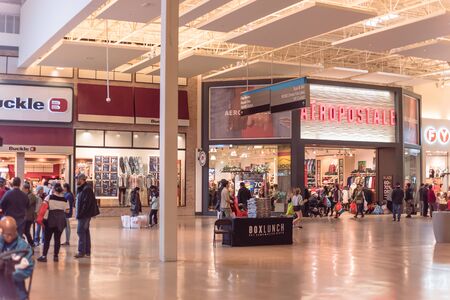 GRAPEVINE, TEXAS, US-NOV 29, 2019: Crowded of diverse people shoppers at Grapevine Mills mall during...