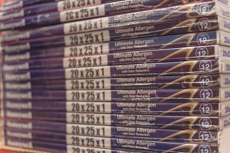 IRVING, TX, US-NOV 30, 2019: Ultimate allergen with odor reduction air filter by Honeywell selling at Home Depot. Electrostatic charge of pleated material block dust, debris, pollen, pet danderのeditorial素材