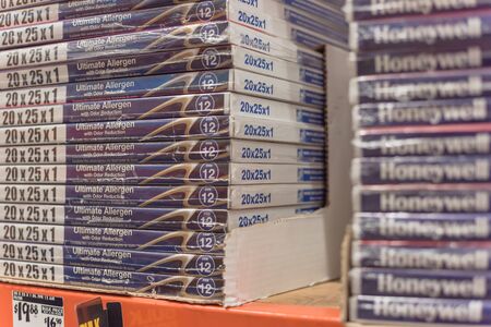 IRVING, TX, US-NOV 30, 2019: Ultimate allergen with odor reduction air filter by Honeywell selling at Home Depot. Electrostatic charge of pleated material block dust, debris, pollen, pet danderのeditorial素材