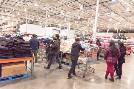 Crowded people shopping at clothes department in Costco Wholesale big-box store on Black Fridayのeditorial素材