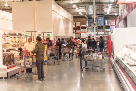LEWISVILLE, TEXAS, USA-NOV 29, 2019: Various meat and seafood bulk products at Costco Wholesale big-box store. Customer stock up food for Black Friday and long holiday weekends.のeditorial素材