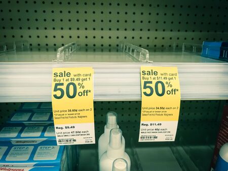 DALLAS, TX, US-FEB 6, 2020: Empty shelves at Walgreen pharmacy near Dallas during the Coronavirus outbreak. Face masks with earlloops are all sold out. Novel 2019-nCoVのeditorial素材
