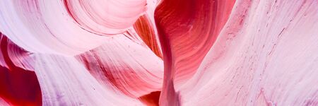 Panorama view texture background inside Antelope Canyon, Page, Arizona. Corridors and smoothing hard edges to form characteristic flowing shapes. Formed by the erosion of Navajo Sandstoneの写真素材