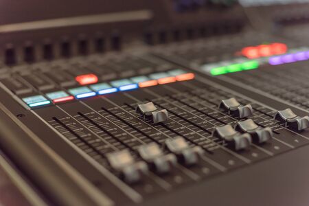 Colorful sound mixer control DJ turntable close-up