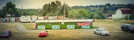Panoramic view seasonal firework stand with customer shopping in rural area outside Seattle, Americaのeditorial素材