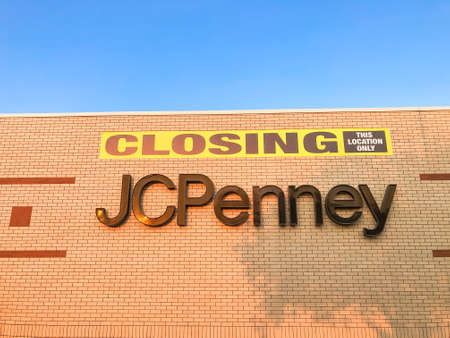 Close-up view closing sign at facade building of J.C. Penney retail store in shopping mall near Dallas, Texas, USAのeditorial素材