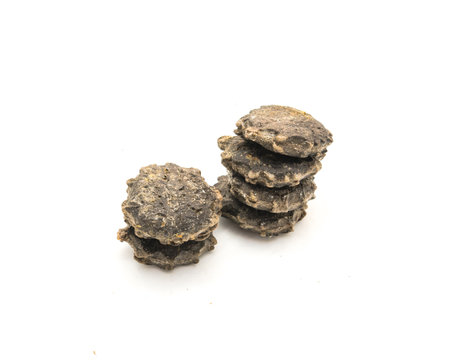 Group of gac seeds (or momordica cochinchinensis) isolated on white background. It is a perennial melon grown throughout Southeast Asian countries and Northeastern Australiaの写真素材