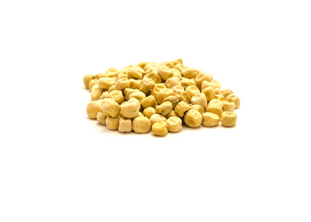 Pile of garden pea seeds for planting isolated on white background. Non treated organic dry pea for seedling.の写真素材