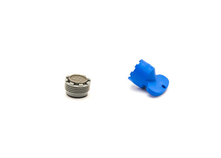 Clean brand new faucet aerator and plastic removal opener isolated on white background. Handy tool...