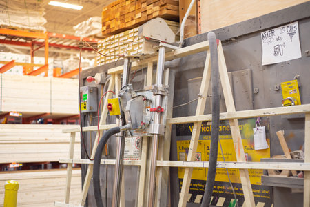Vertical panel saw near lumber yard at hardware home improvement store in Dallas, Texas, industrial...