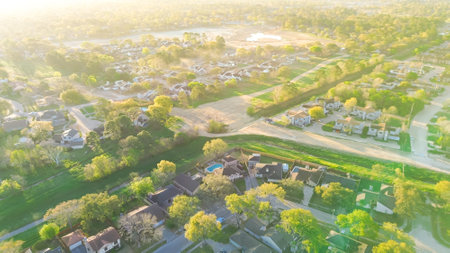 Lush green residential neighborhood North Houston, Texas along Antoine Dr, Arncliffe Dr with construction site of stormwater detention basins to provide flood damage reduction heavy storm, aerial. USAの写真素材