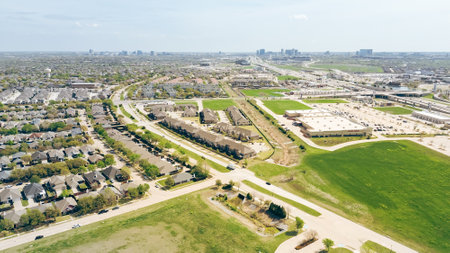Mixed use development along Highway 121 in The Colony, Denton County, suburbs Dallas, Texas, commercial buildings, entertainment centers, residential area, vacant land to grow near Plano downtown. USAの写真素材