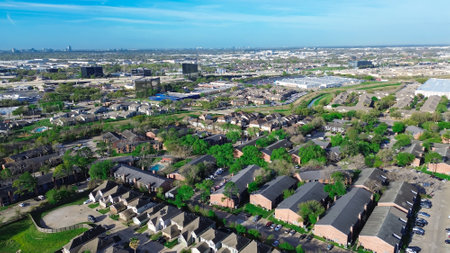 Urbanization in North Houston mixed use development area of residential house, new construction strata landed housing, retailer, warehouse, office building campus Fairbanks, Northwest Crossing. USAの写真素材