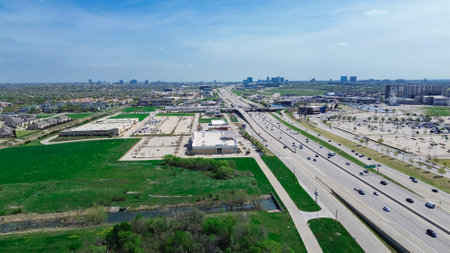 Vacant land along busy Sam Rayburn Tollway, State Highway 121 and frontage road with downtown Plano...