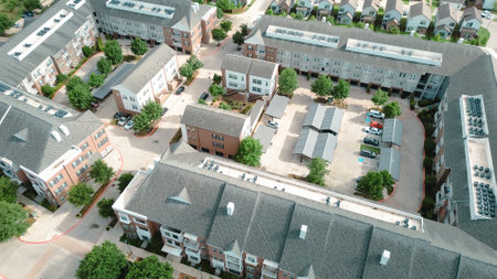 Rooftop HVAC package units on multistory senior living, retirement community apartment homes complex...