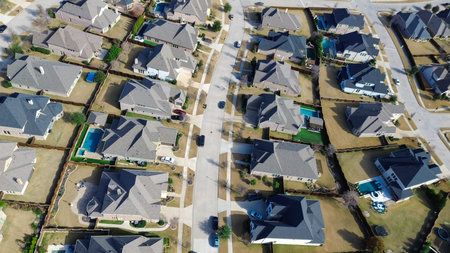 Prosper, Texas subdivision two-story single-family homes with fenced yards, backyard pools, clean...