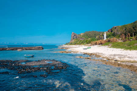 Beautiful mountain and blue beach. view from Thoi Loi mountain at Ly Son Island, Quang Ngai...