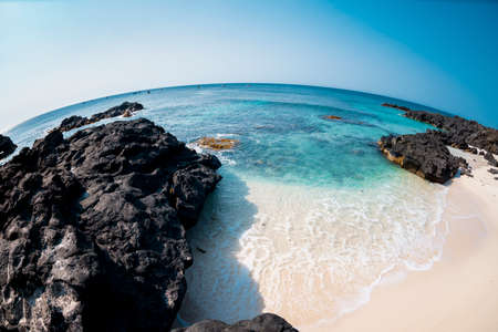 Beautiful beach with crystal clear turquoise water and white sandの写真素材
