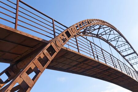 The old iron bridge against the sky
