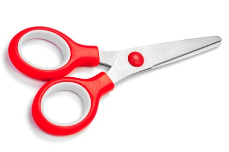 Scissors with red handles on white with shadow