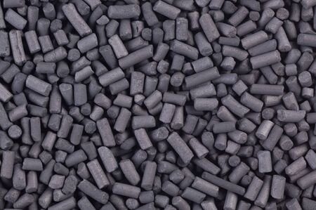 Activated carbon granules abstract background