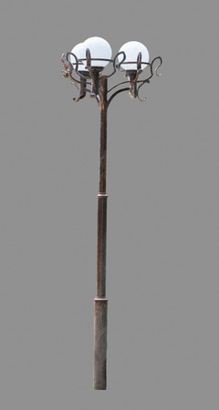 Photo of an old street lamppost isolated on gray backgroundの写真素材