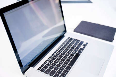 Open laptop with white background. Note book concept.の写真素材