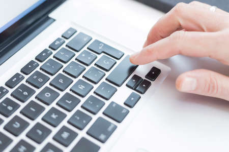 Hands of professional businessman working in gray computer. Work with laptop concept