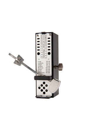 Classic analog black and metal metronome isolated on white background.の写真素材