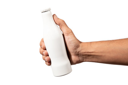 Male hand holding a white beer or soda bottle mockup isolated on white backgroundの写真素材