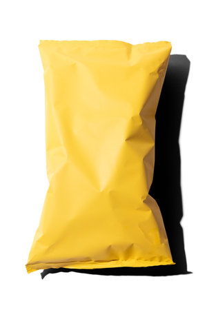 Yellow potato chips package mockup isolated on white backgroundの写真素材