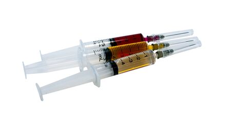 isolated syring for drug inlection on a white backgroundの写真素材