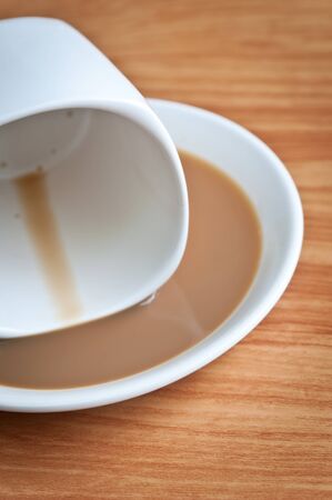 Drunk coffee cup on the wooden table の写真素材