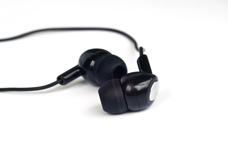 black ear buds isolated on a white background