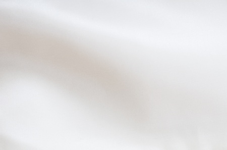 Background of white silk fabric texture.の写真素材