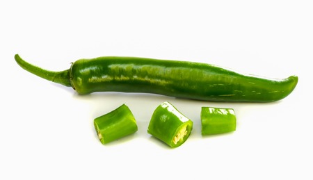 spicy  hot chili peppers isolated over white .の写真素材