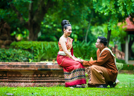 Portrait of man and woman in  traditional clothes of the north of Thailandの写真素材