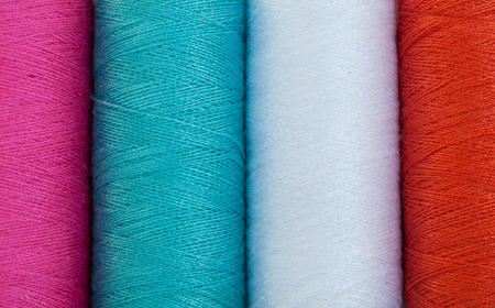 Close up  of coloured  thread background .