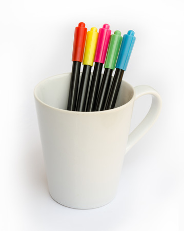 colorful marker pens on a white glass.の写真素材