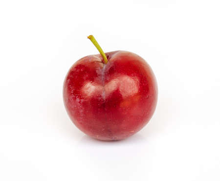 Ripe plums isolated on white background .の写真素材