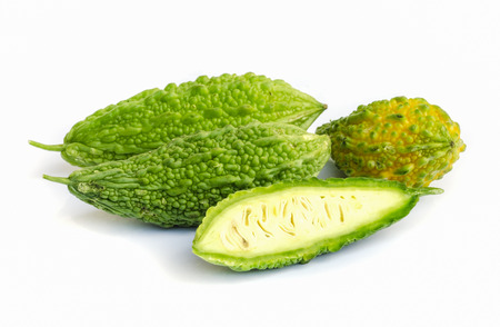 bitter gourd and slice on the white background .の写真素材