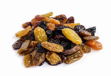 Sweet mix dried fruits on white background.の写真素材