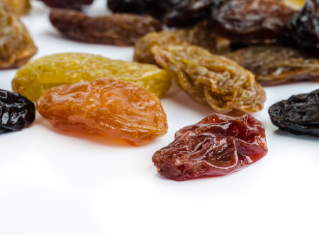 Sweet mix dried fruits on white background.の写真素材