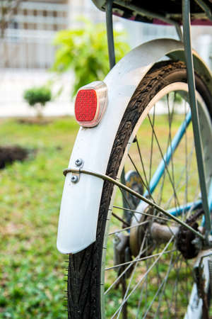 Close up of Old bicycle part in the garen.