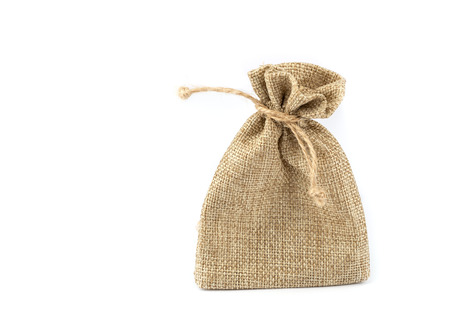 Burlap gift sack isolated on white background.の写真素材