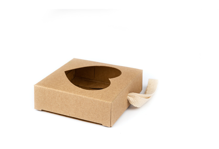 brown paper box with Heart shape window on white background.の写真素材