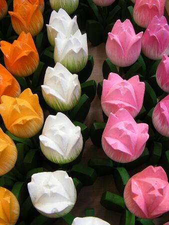 Colored flowers made of wood の写真素材