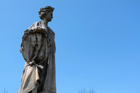 Statues woman inside urban parkの写真素材