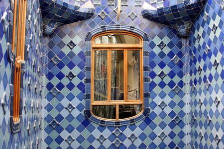 BARCELONA, SPAIN - AUGUST 13, 2007: Barcelona Catalunya Casa batllo interior blue and white tiles central light well Casa Batllo architect Antoni Gaudi spain eu europe Cataloniaのeditorial素材