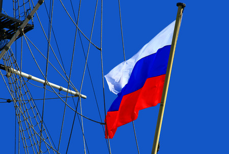 Flag of Russia against blue sky.の写真素材